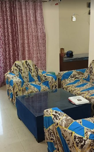 Furnished common lounge at YS Stay Hub PG Sector 137 Noida